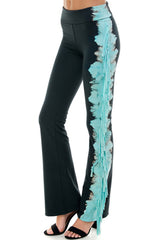 Black and Turquoise Yoga Pants with fringe detail on the legs.