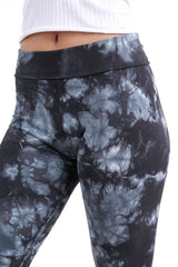 Close up of T-Party black and gray tie dye yoga leggings. Skinny fit with foldover waist.
