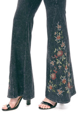 Close up of floral pattern embroidery on leg of T-Party yoga pants. Made in USA