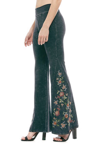 Black mineral wash yoga pants with floarl embroidery. Wide bell bottom flare. Made in USA